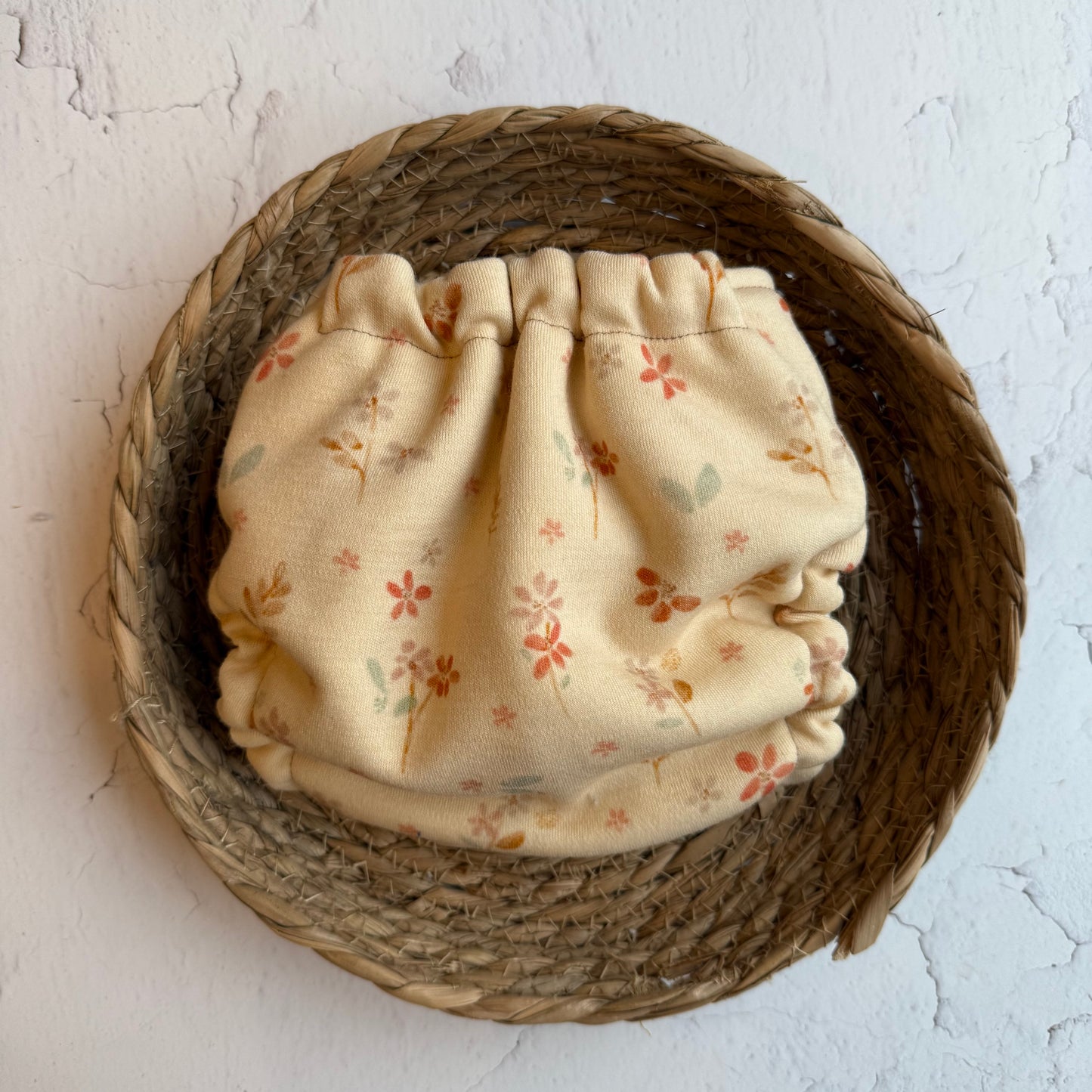 Glücksgriff Wollwindel „Pastellblume“ Midi - Unikat