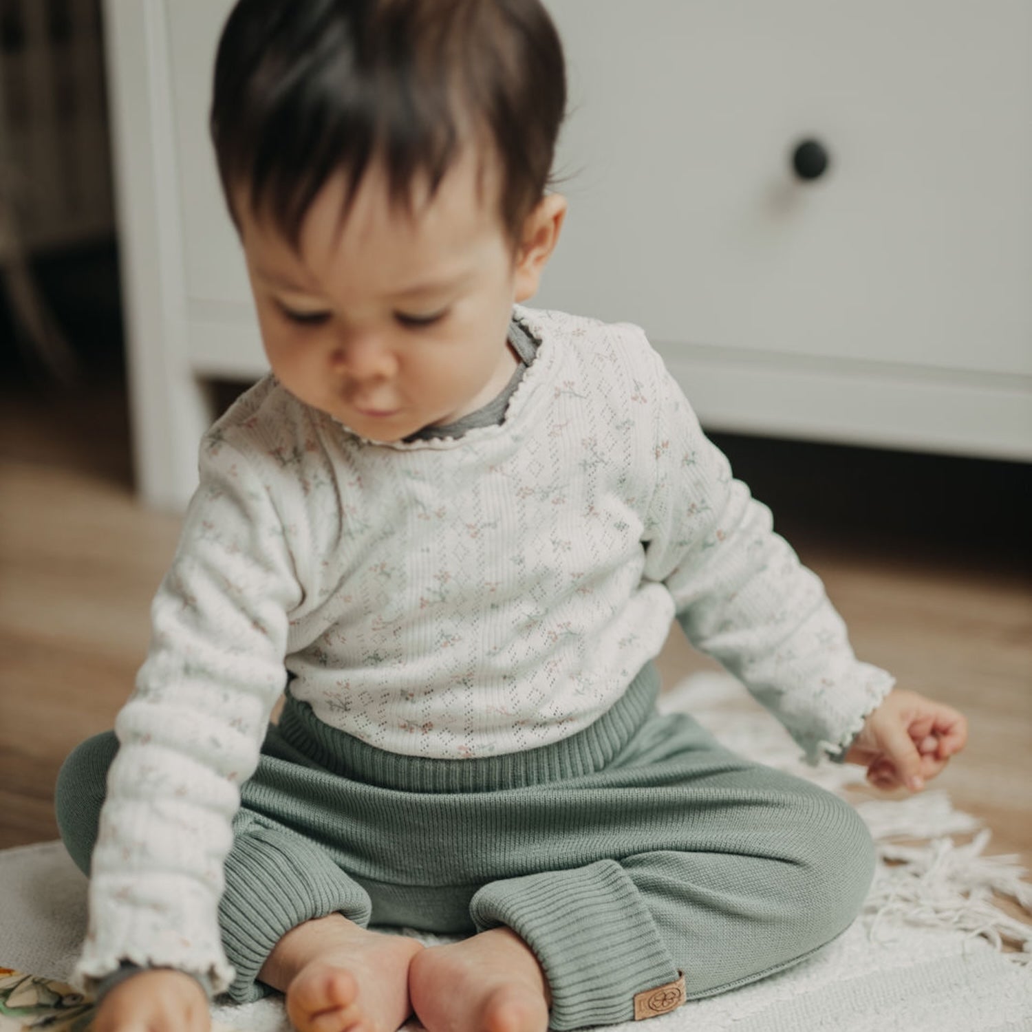 Wollkleidung als Geschenk zur Geburt