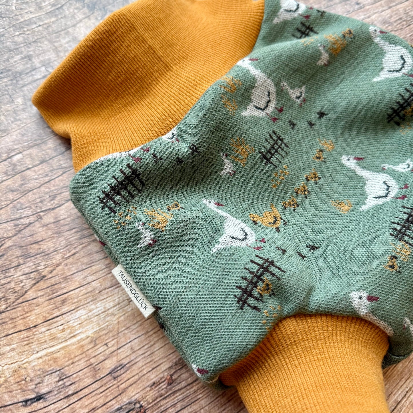 Wollschlupfhose „Gänseglück“ - Tausendglück